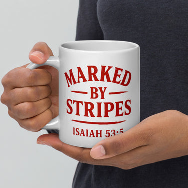 Model holding large 20oz Marked by Stripes mug – red gospel logo facing camera
